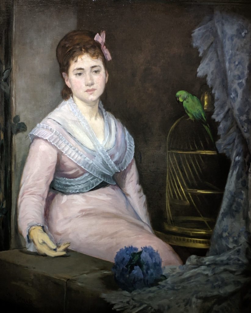 Impressionist - The Indolence, Woman in dress sitting next to the parrot cage.