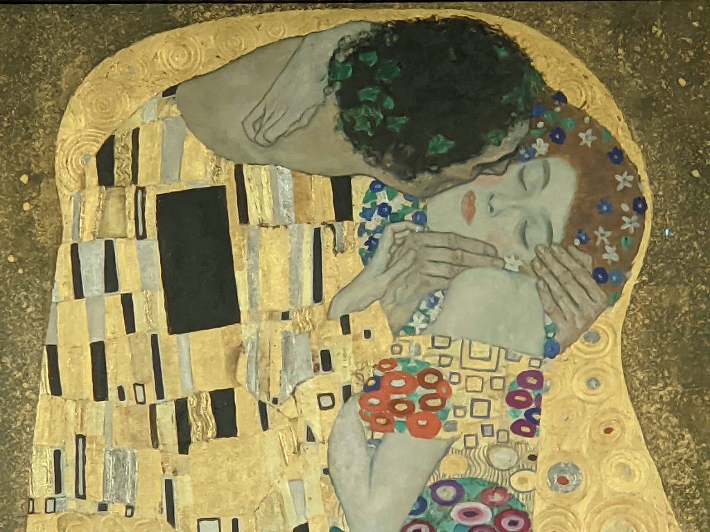The upper part of the painting: The Kiss by Klimpt